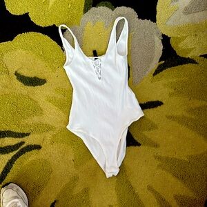 Crisp white body suit from H & M